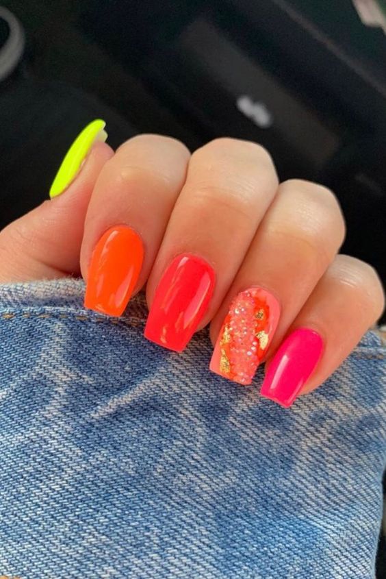Neon nails in pink and orange, square shape, vibrant style