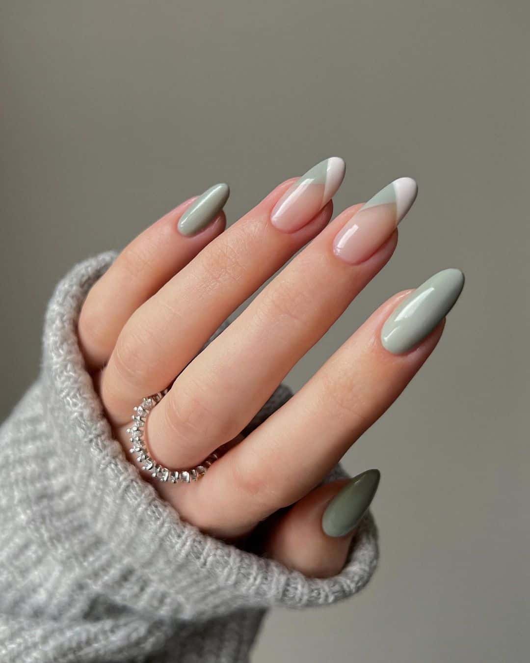 Sage green geometric nails, almond shape, modern art style