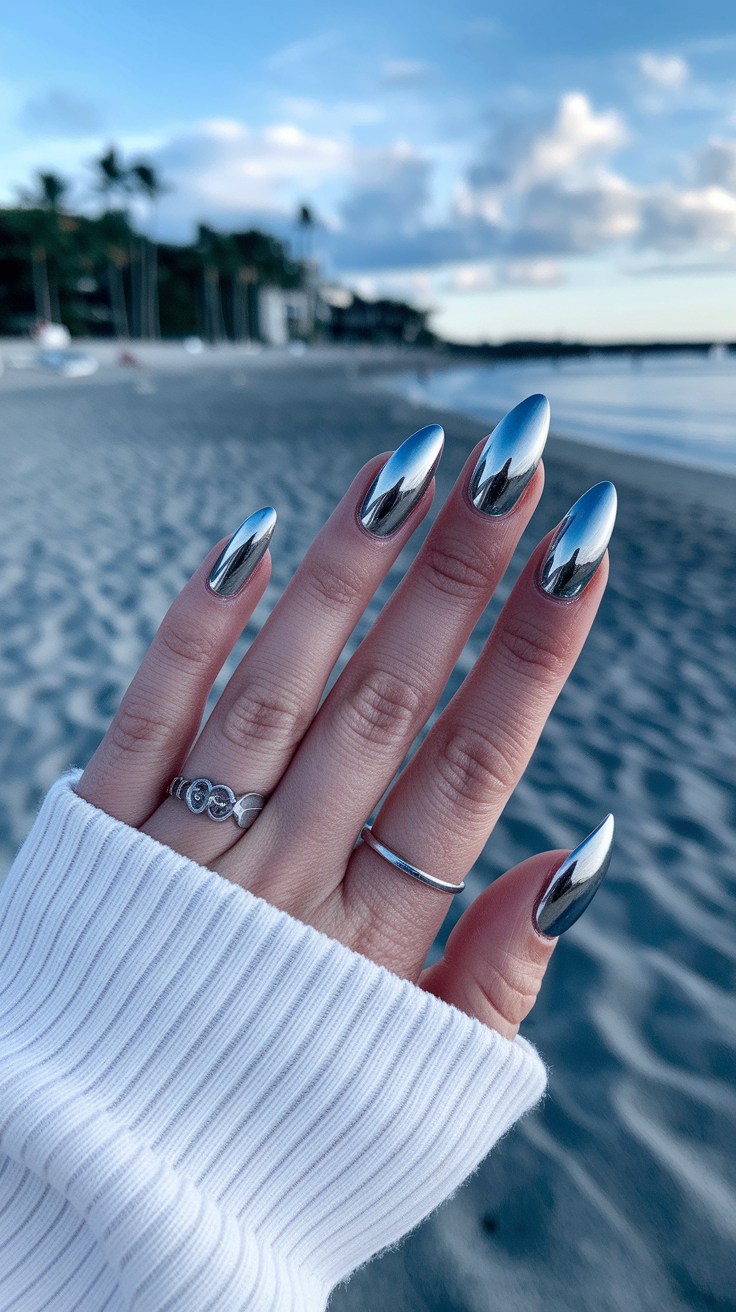 Chrome nails, almond shape, futuristic style