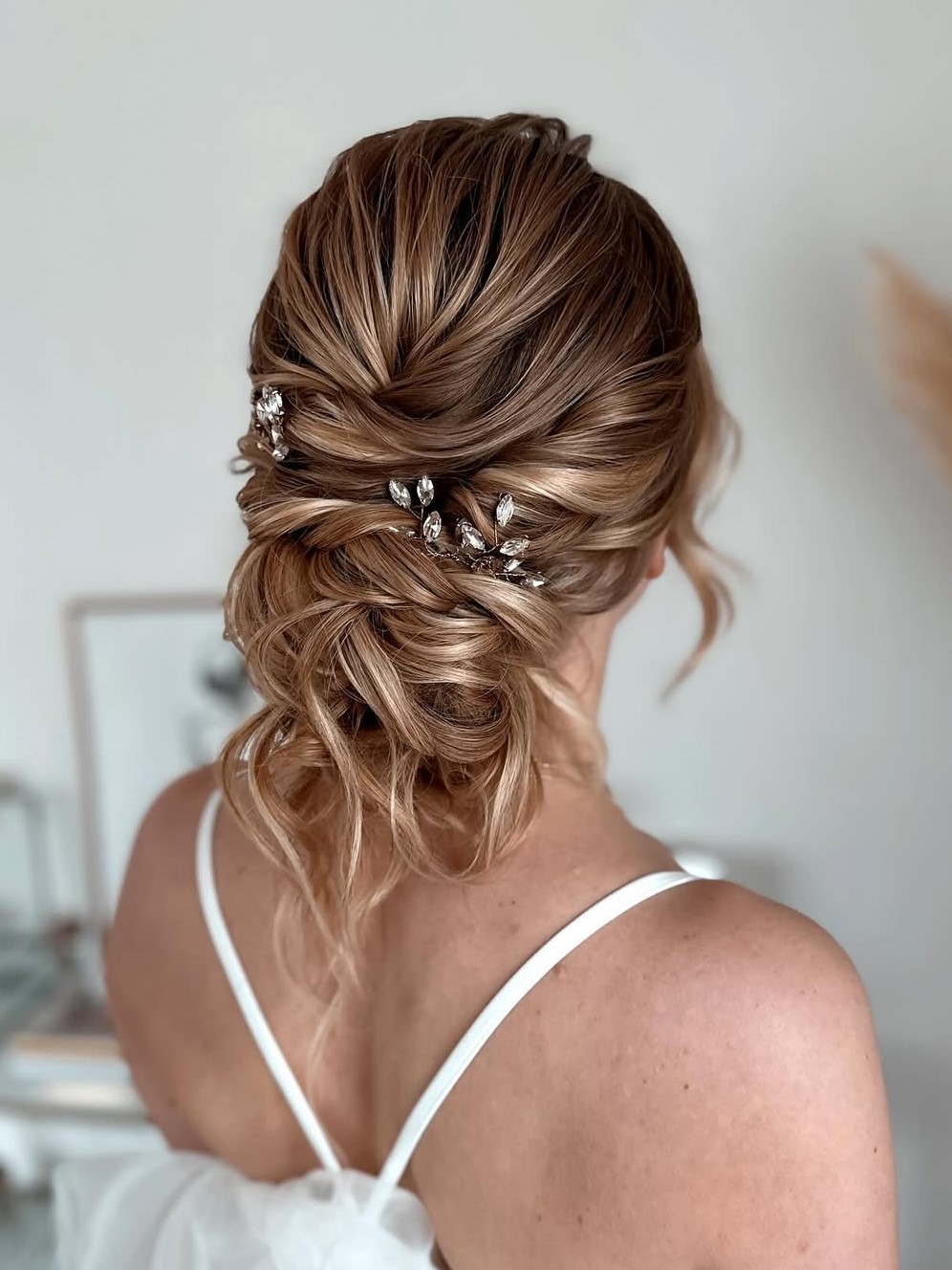 Elegant twisted bun with decorative pins