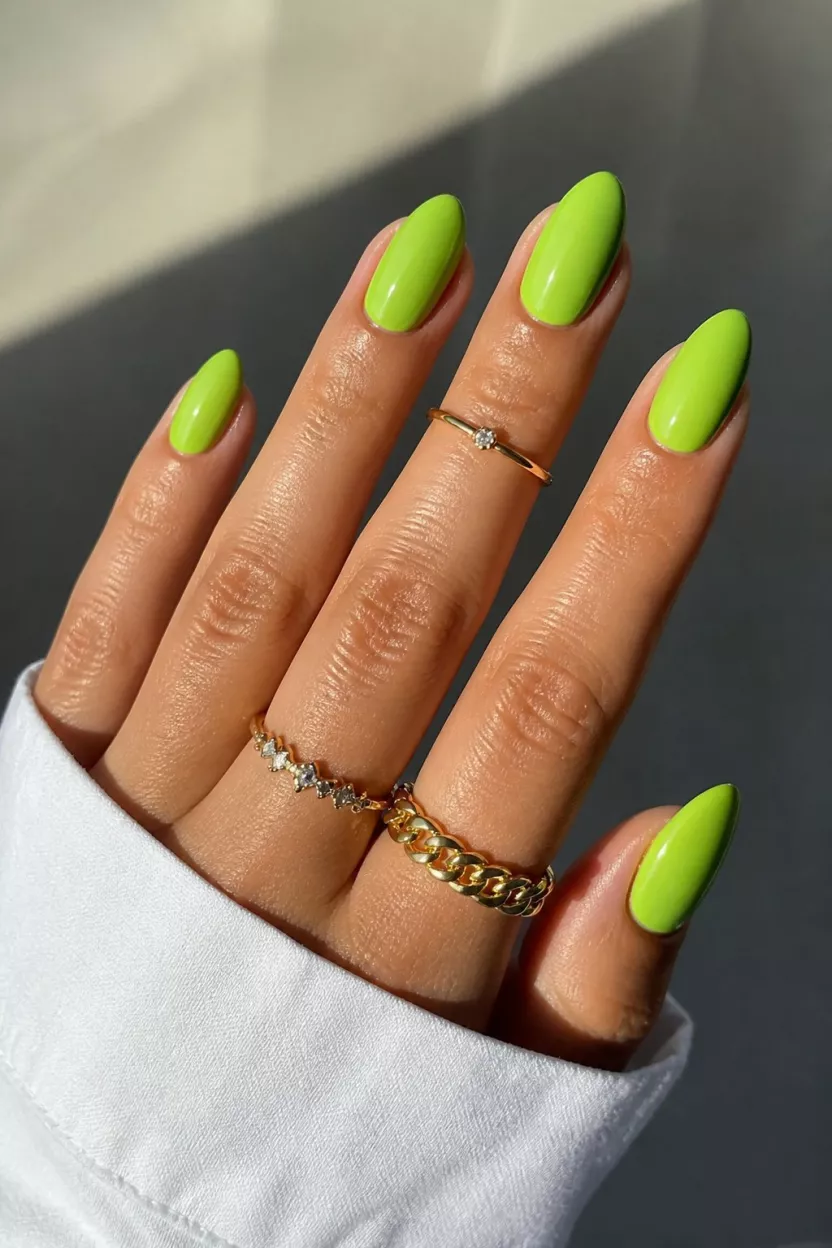 Vibrant lime green nails for a bold look.