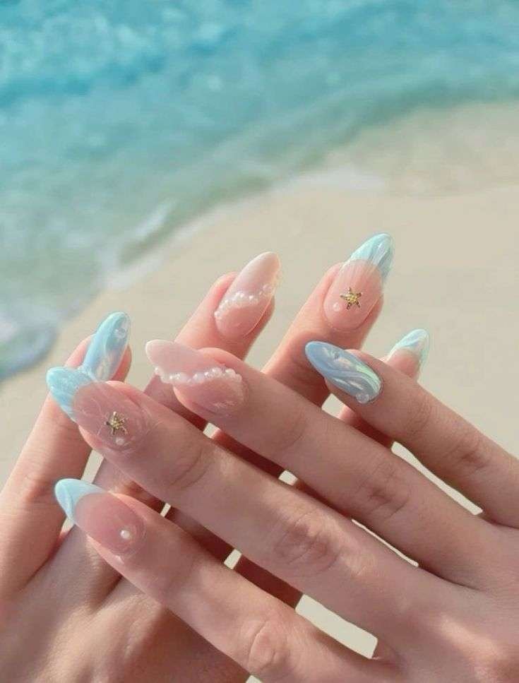 Aquatic nails with starfish accents.