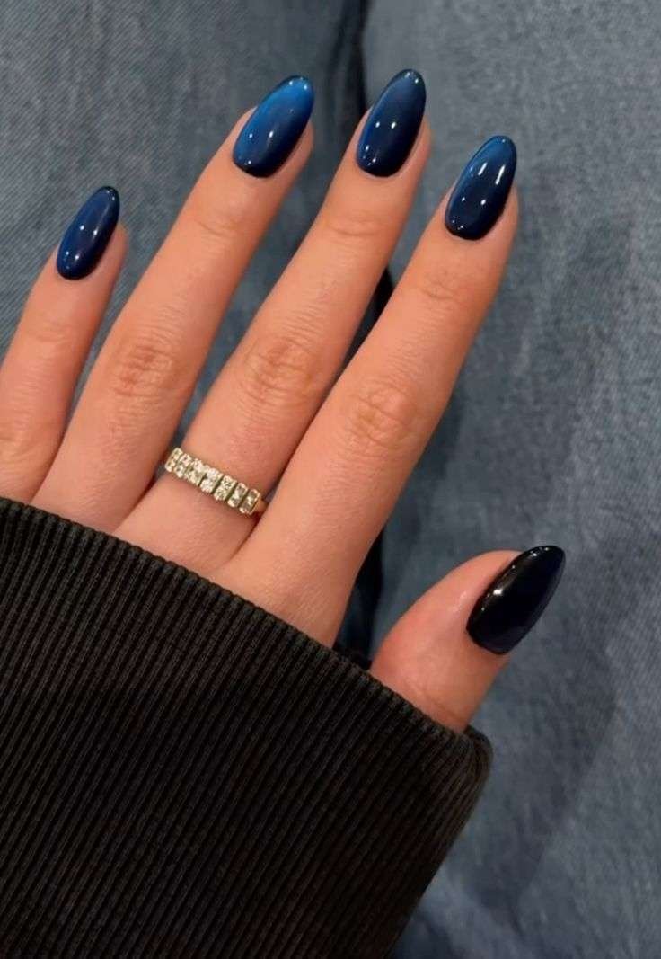 Elegant midnight blue nails for a sophisticated look.