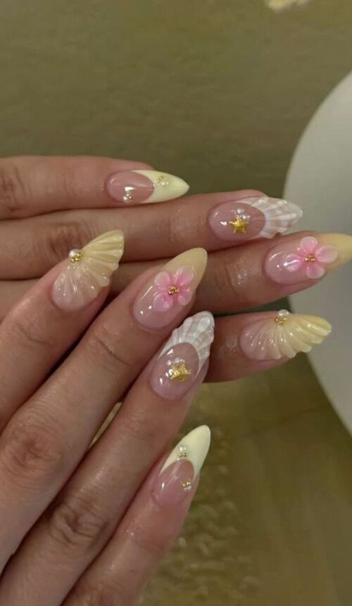 Butterfly and floral accent nails.