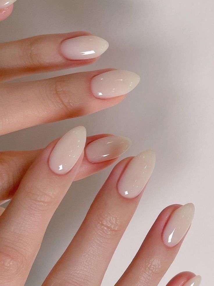 Milky nude nails with an elegant finish.