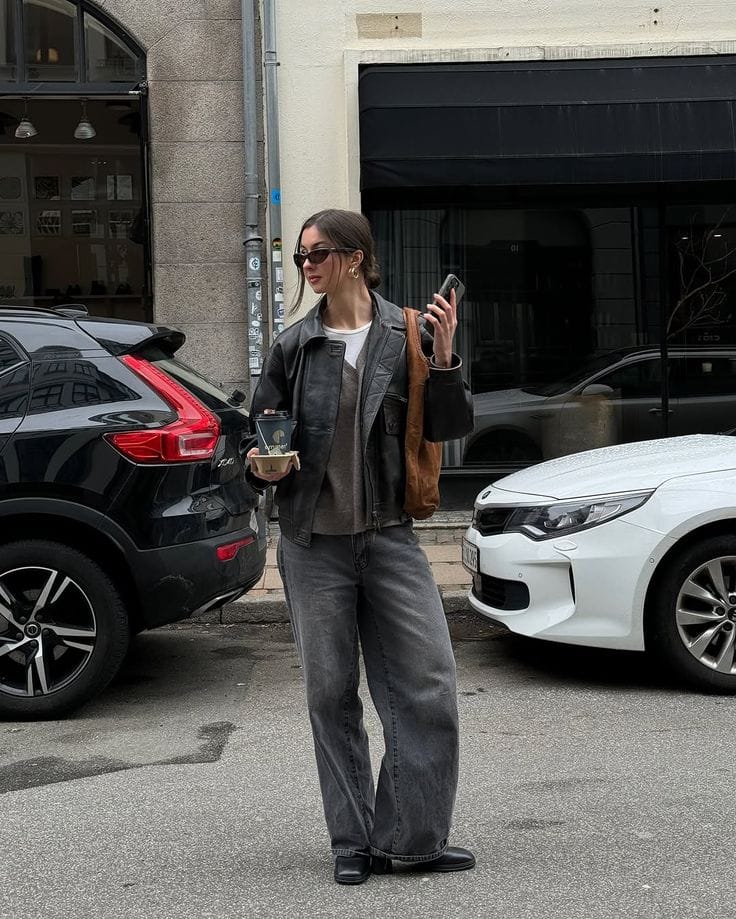 Layered neutral tones with leather jacket
