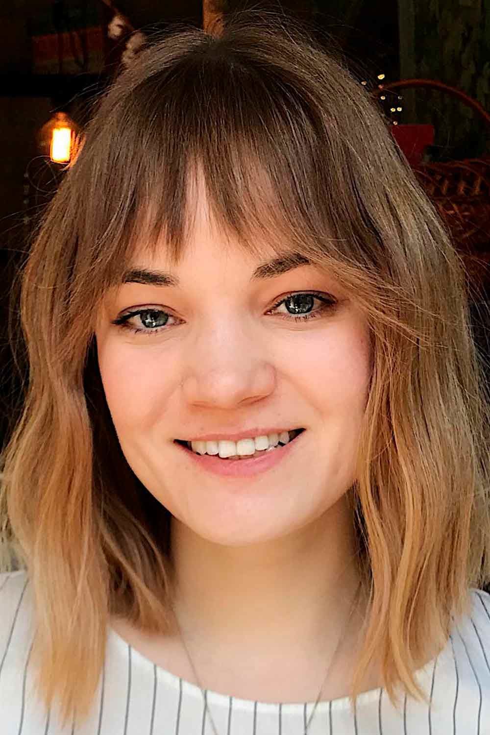 Playful lob with wispy bangs and dimension