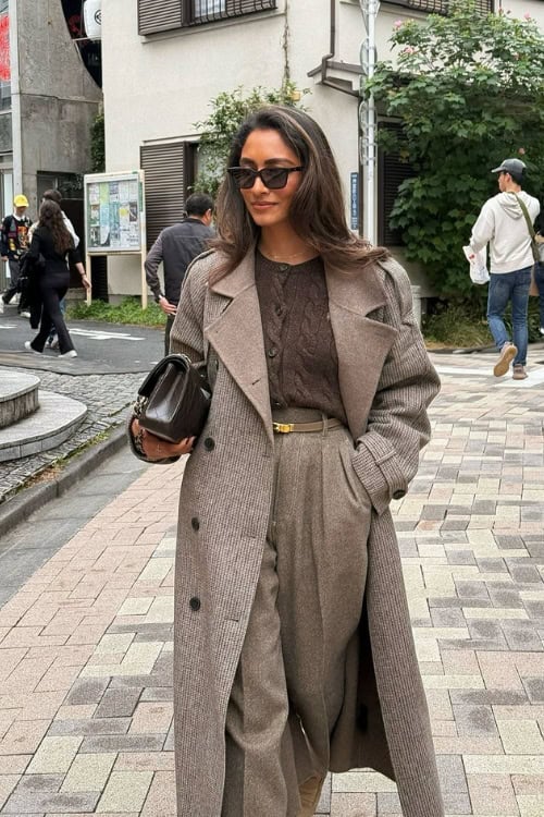 Gray trench coat with tailored trousers
