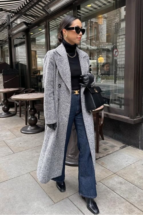 Gray coat over black turtleneck with jeans