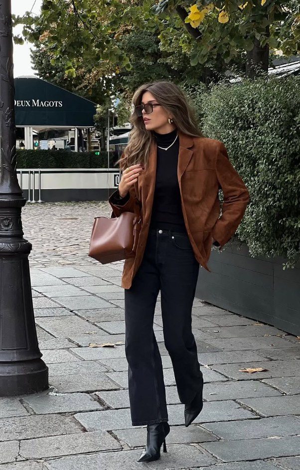 Brown blazer over black outfit