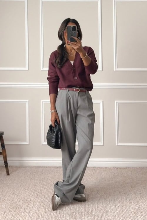 Burgundy cardigan with gray trousers